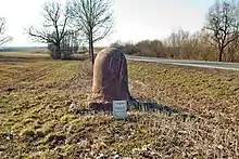 Halbmeilenstein an der B 80 westlich von Lüttchendorf