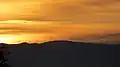 Im Sonnenuntergang von Graz aus gesehen