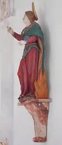 Statue einer Heiligen, wahrscheinlich Thekla (möglicherweise aber auch Afra), an der Südwand des Langhauses