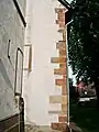 Südwestecke Langhaus, Eckquaderung mit aufgemauerter Erhöhung