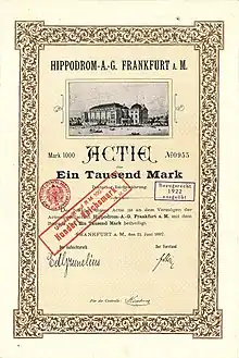 Gründeraktie der Hippodrom-A.-G. über 1.000 Mark vom 21. Juni 1897 mit Unterschrift des Frankfurter Privatbankiers Eduard von Grunelius als Vorsitzender des Aufsichtsrates. Zweck der Gesellschaft war die Förderung des Sports, insbesondere des Reit- und Fahrsports. Auf der Aktie abgebildet ist das pompöse Gebäude an der Ecke Wilhelmstraße und Forsthausstraße, heute Stresemann- und Kennedyallee, im Zweiten Weltkrieg von Bomben getroffen und 1956 abgerissen.