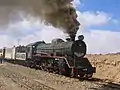 Dampfsonderzug im Bahnhof Faraifa. Lokomotive 82, gebaut 1959 in Japan