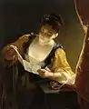 Junge Frau beim Lesen eines Briefes