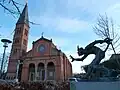 Jesuskirche und N. H. Jacobsens Statue „Troll, der Christenfleisch wittert“