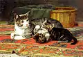 Eine Katze mit ihren Jungen