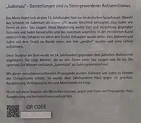 Hinweisschild (Ausschnitt) zur Judensau (seit 2023)