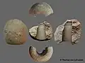 Fragment einer durchbohrten Geröllkeule der mittleren Jungsteinzeit (Fundort: zwischen  Duisburg-Serm und Duisburg-Mündelheim)