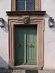 4. Tür mit verkröpften oberen  (Evangelische Kirche in Köslau, Königsberg in Bayern)