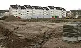 Blick von Norden auf das Gelände mit den Fundamentresten nach Beginn der Bauarbeiten für ein Einkaufszentrum, 2017