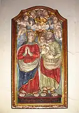 Holzrelief: Maria und Josef mit dem Jesuskind