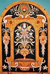 Blumenkomposition mit Wappen des Fürststifts