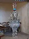 Taufstein mit kunstvollem Aufsatz