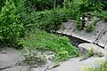 Überreste der Kleinbahnbrücke in der Nähe von Aglohnen