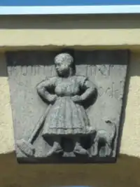 Reichenbach (Eulengeb.) - Zwei Reliefs: (l.) Uf Heem zu! (Auf dem Weg nach Hause) (r.) Komm mer ock! (Komm mir nur! (Mit dem Finger drohenb.))