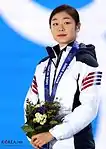 Kim Yuna, Olympiasiegerin 2010 und Silbermedaillistin 2014, bei der Siegerehrung in Sotschi 2014