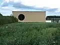 Ricola-Kräuterzentrum in Laufen (Wahlenstraße 117), eines der größten Gebäude aus Lehm. Gestaltet von Herzog & de Meuron.