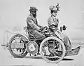 Léon u. Mme. Bollée auf Tricycle 3 CV (1897)