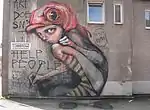 „Art Doesn't Help People, People Help People“ (Lüneburg, Wandfärberstraße)