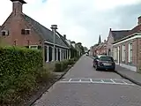 Eingang zur Westerhofstraat,  an der sich eine Kirche und Pfarrei befindet (2010)
