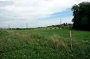 Lobsigensee – Ausgrabungsfeld im Hintergrund Seedorf