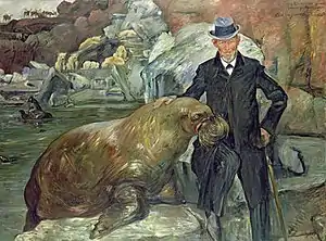 Porträt Carl Hagenbeck mit dem Walroß Pallas