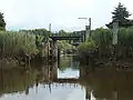 Schleuse zwischen Stör und Münsterdorfer Hafen; im Hintergrund ist die Schleuse zum Breitenburger Kanal zu sehen