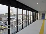Blick von der Fußgängerbrücke zum Bahnhof Naka-Okazaki