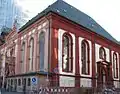 Ansicht Anfang 2011: die Straßenfront rechts hat bereits einen kräftigen Rotton erhalten