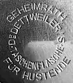Markung auf dem Deckel von Dettweiler’s Taschenflaschen