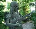 Engel mit Gitarre auf dem Grabstein von Max Unger, Friedhof Dahlem, Bronze, eigenes  Werk