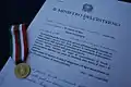 Goldene Verdienstmedaille mit Urkunde des italienischen Innenministeriums