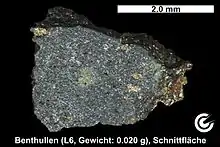 Fragment aus dem dunklen Bereich des Meteoriten Benthullen