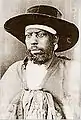 Menelik II.
