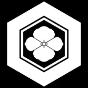 Wappen der Shiiya-Hori (Schildkrötenpanzer mit Blume)
