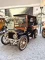 Mors Typ N Tonneau von 1910 in der Cité de l’Automobile – geschlossener Wagen mit Passagiereinstieg im Heck