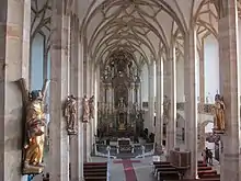 Statuen der Apostel und Evangelisten in der Kirche Mariä Himmelfahrt in Most (1730–1738)