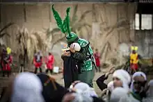 Szene aus einem Trauerschauspiel zu Aschura im Iran