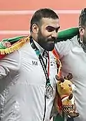 Mustafa Al-SaamahRang vierzehn mit 58,40 m