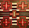 Navajo mit Decke, dritte Phase, ca. 1890-95. Millicent Rogers Museum, Taos