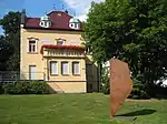 Skulptur Am Wall