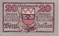 20-Heller-Schein mit Wörgler Wappen und einem geflügelten Eisenbahnrad, das den Aufstieg Wörgls als Eisenbahnknotenpunkt symbolisiert