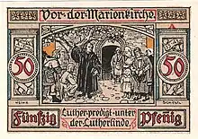 Scheinrückseite A: „Vor der Marienkirche – Luther predigt unter der Lutherlinde“