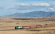 Eine ehemalige SNCF CC 72000, heute als DF 115 im Besitze der ONCF, mit einem Personenzug bei Taourirt