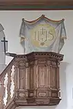Kanzel mit Arm und Kreuz
