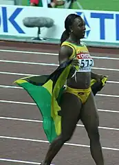 Weltmeisterin mit zwei Tausendstelsekunden Vorsprung: Veronica Campbell, zuvor unter anderem aktuelle Olympiasiegerin über 200 Meter und hier mit ihrer  Sprintstaffel und über 200 Meter noch zweimal mit Silber dekoriert