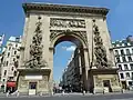 Boulevard Saint-Denis mit dem namensgebenden Porte Saint-Denis (Juni 2014)