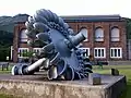 Rad einer Pelton-Turbine am ehemaligen Werksgelände