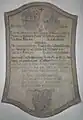 Epitaph der Familie von Rainer mit Nennung des Johann Ferdinand Leopold († 1725), seiner Gemahlin Maria Franziska († 1743), und der Maria Anna († 1764).