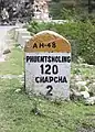 Kilometerstein bei Chapcha (Bhutan)