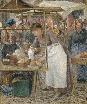 Metzgerin auf dem Wochenmarkt